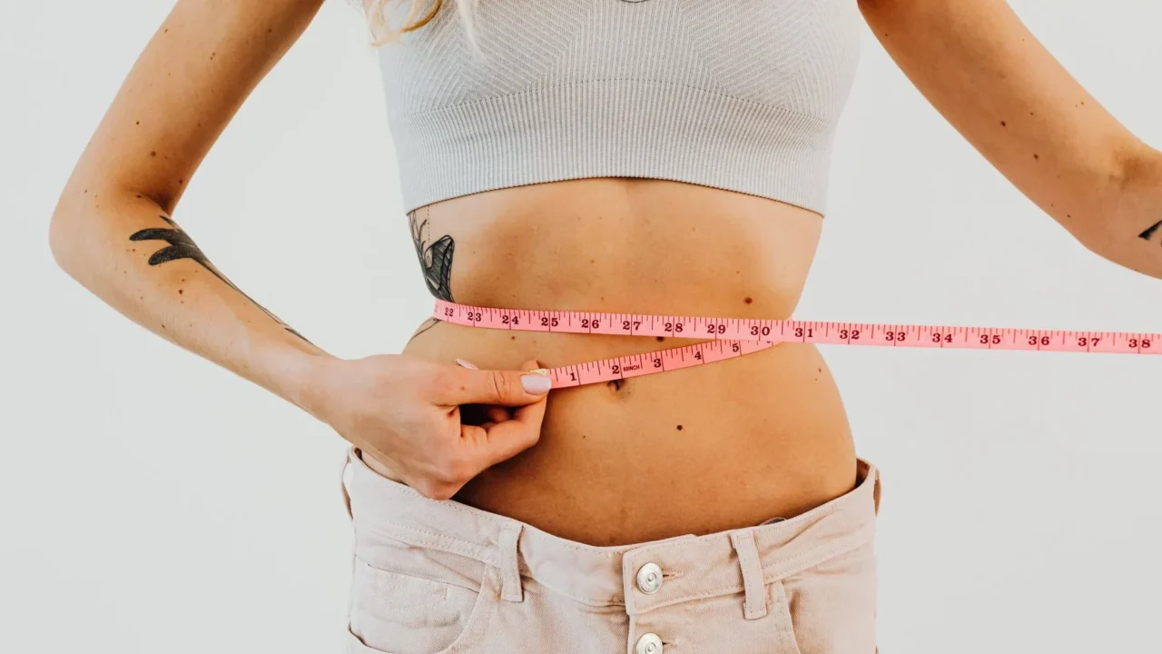Woman Measuring Waist Healthy Weight