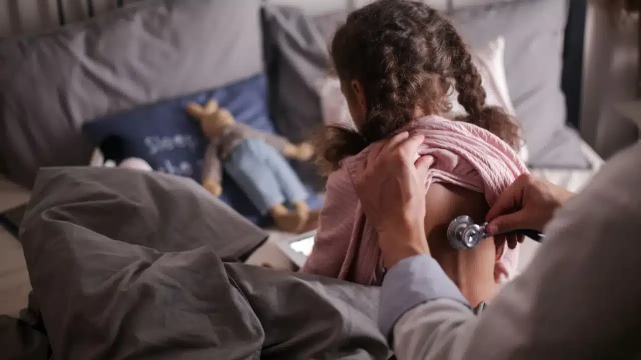 child doctor patient bed