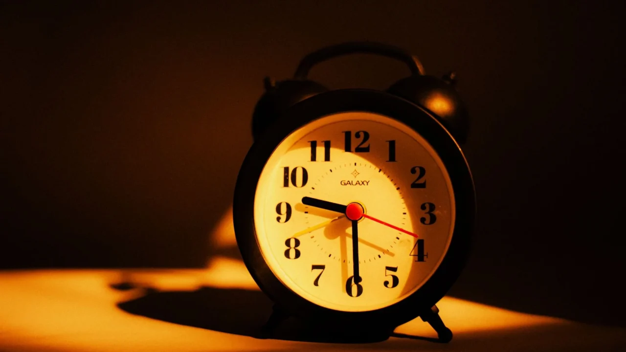 couple bedroom clock time