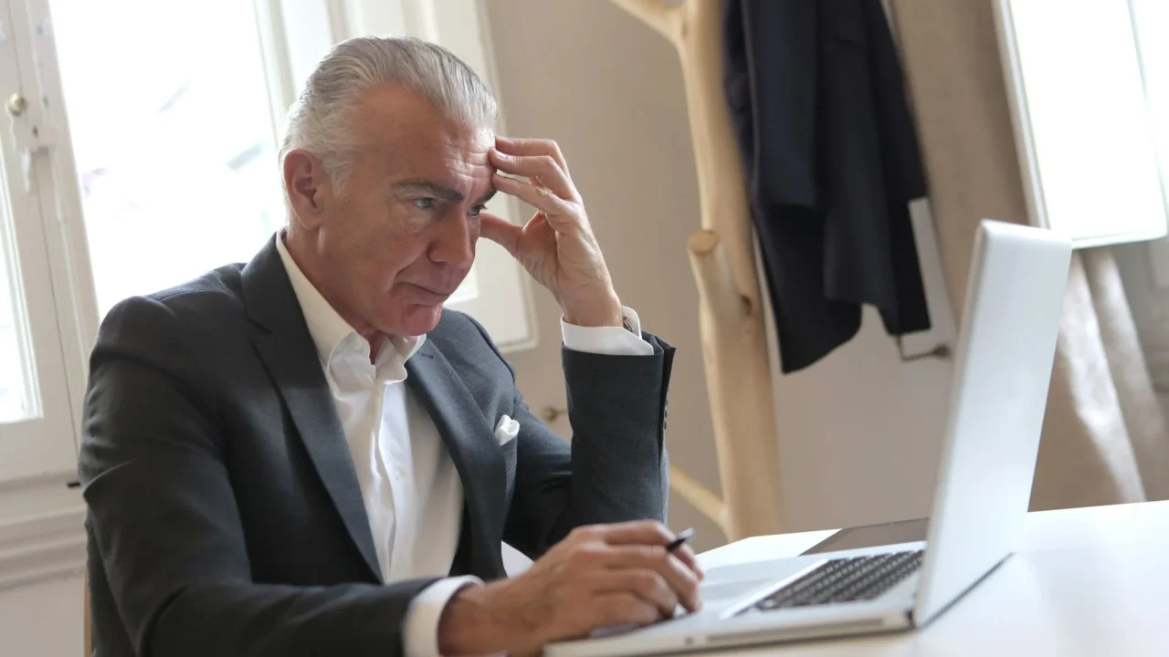 stressed businessman headache